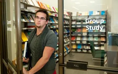 Student at PMA doorway